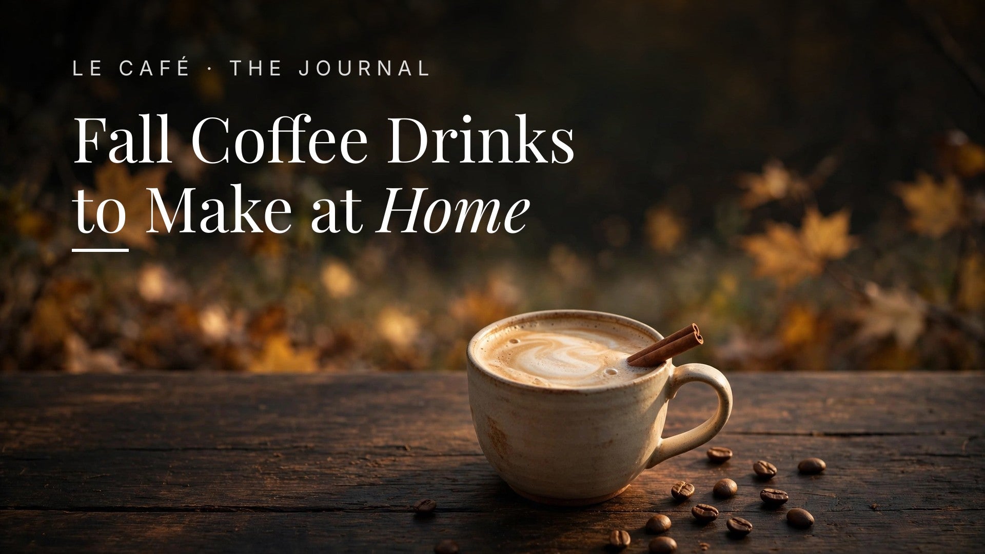 A cozy fall latte on a dark wooden table, Le Café Journal header: Fall Coffee Drinks to Make at Home